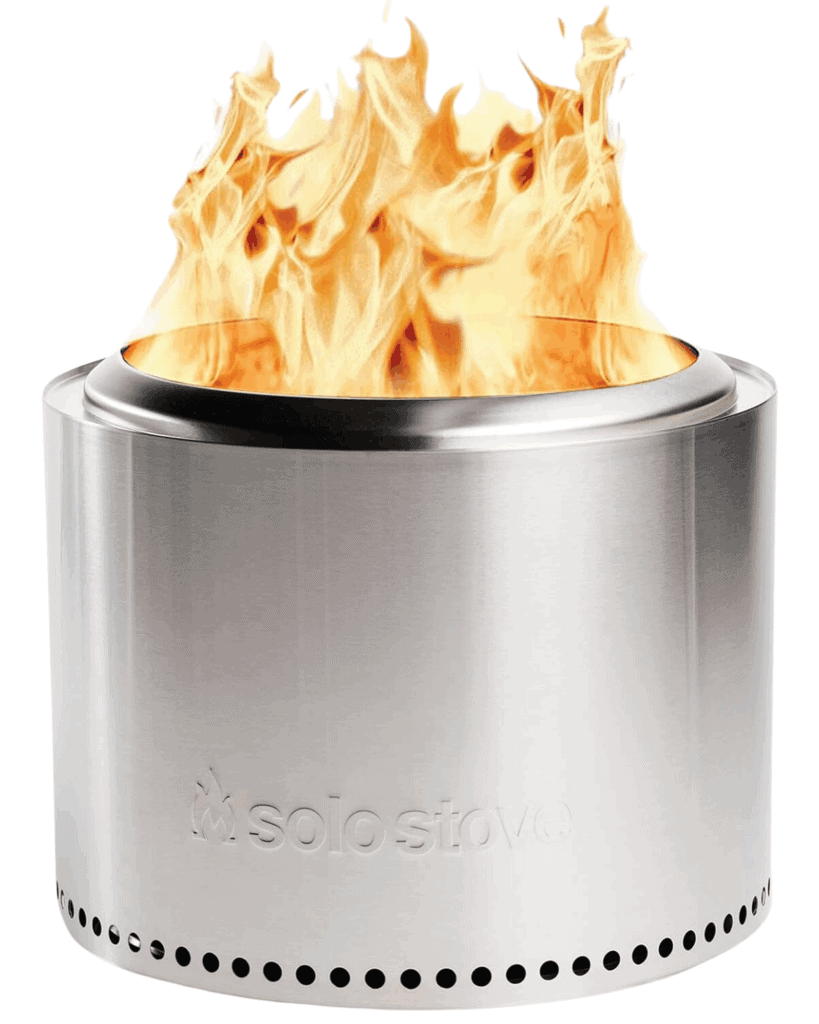 A stainless steel Solo Stove fire pit with visible flames rising from the top. The cylindrical fire pit, featuring air holes near the bottom and the Solo Stove logo, makes an excellent Father's Day Gift for outdoor enthusiasts.