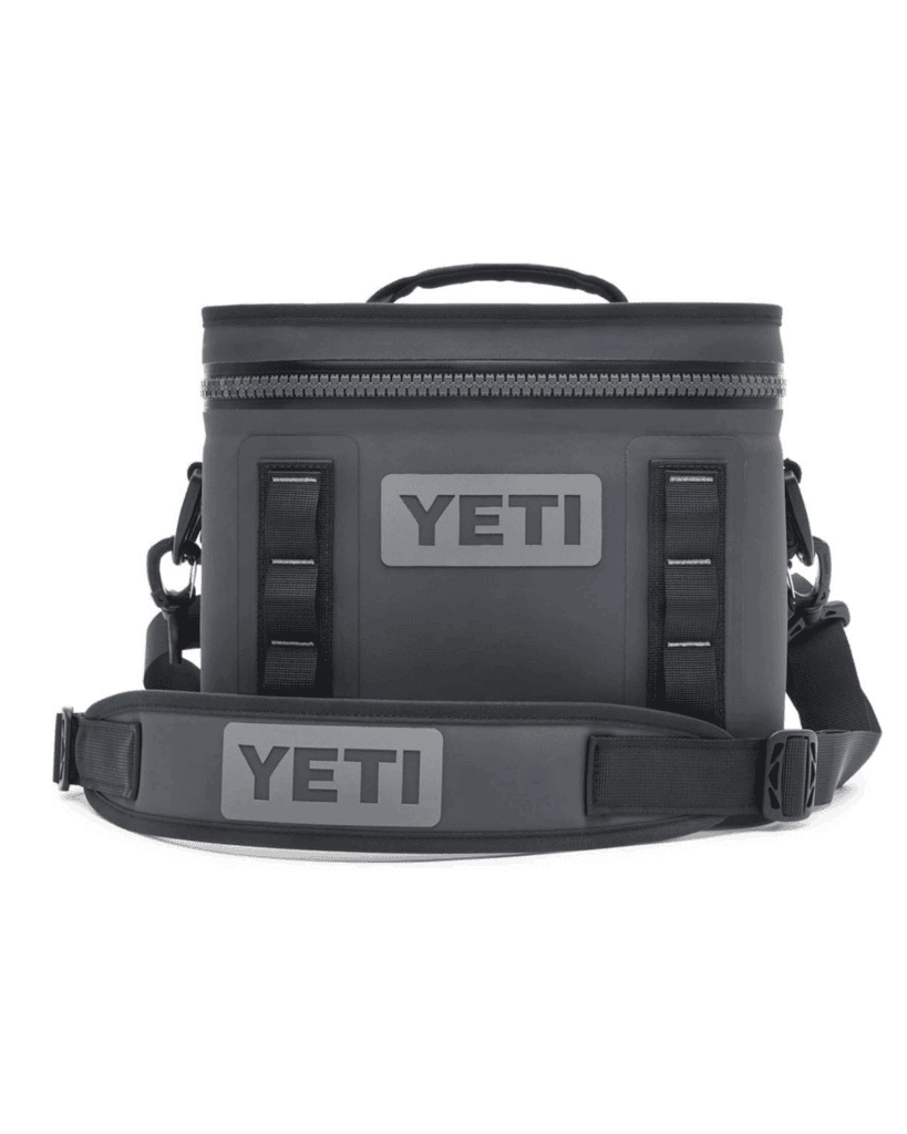 A dark gray YETI soft cooler bag with a zippered lid, padded carrying handle on top, adjustable shoulder strap, and the YETI logo displayed on both the front and the strap—an ideal Father's Day gift for outdoor adventures.