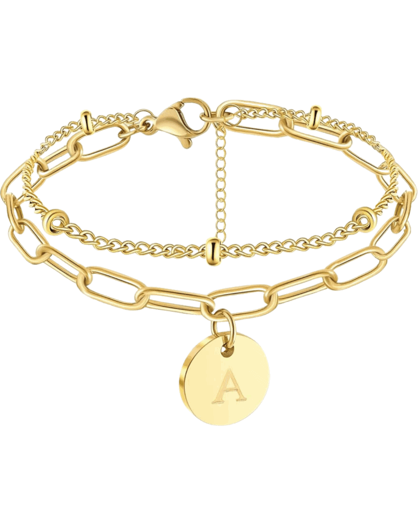 Gold double-chain bracelet with a round charm engraved with the letter "A"—a standout from our Graduation Gift Guide. Features a lobster clasp and a mix of delicate and larger link chains.