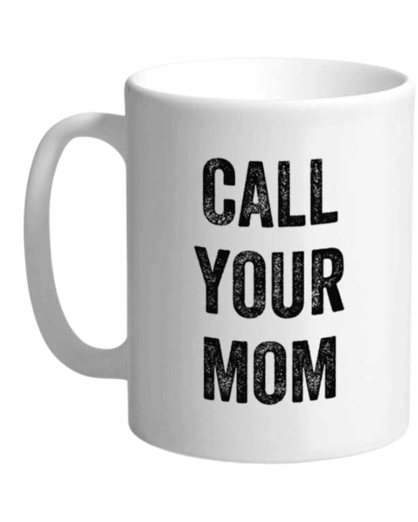A white ceramic mug with the bold black text "CALL YOUR MOM" printed on the side—perfect for anyone on your Graduation Gift Guide.