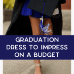 A woman in a blue dress and graduation gown holds a cap and bottle, standing on a sidewalk. Text overlay reads "Graduation: Dress to Impress on a Budget. Read more. thebargainsisters.com.