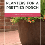 Large brown outdoor planter filled with blooming yellow and orange flowers sits on a brick patio. Text overlay reads, "Best Outdoor Planters for a Prettier Porch – thebargainsisters.com.