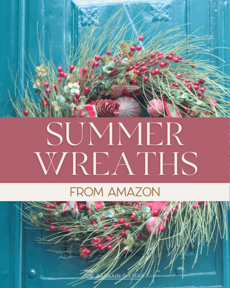 A festive wreath with greenery, pinecones, and red berries hangs on a teal door. Text overlay reads "SUMMER WREATHS FROM AMAZON.