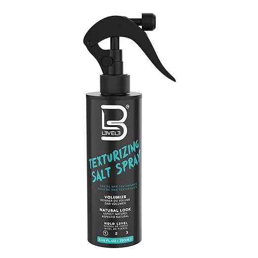 A black spray bottle labeled "Level 3 Texturizing Salt Spray" with turquoise text. Featuring a trigger spray nozzle and hold level indicator, it contains 8.5 fl oz (250 mL). Perfect for Thursday Deals!.