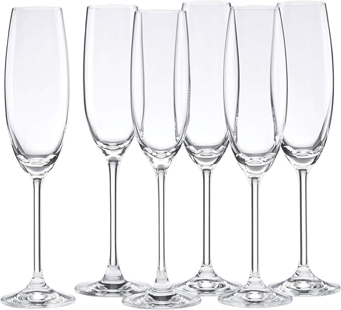 Six clear, empty champagne flutes with long stems are arranged in a row on a white background. Perfect for any celebration, these elegant glasses are closely lined up—discover them now in our exclusive Friday Deals.