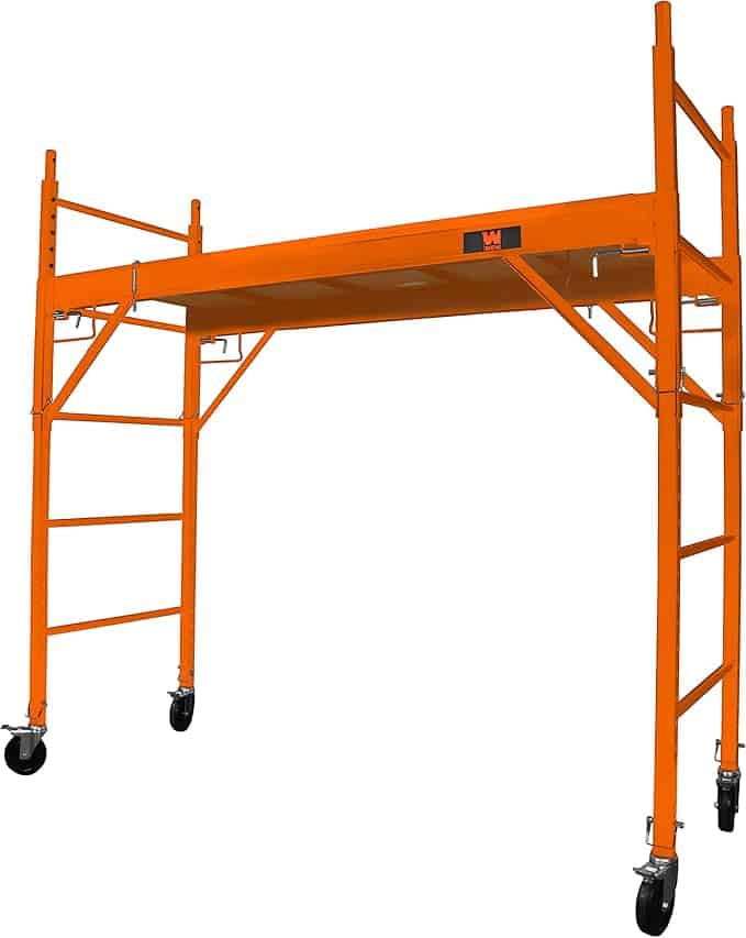 Bright orange metal rolling scaffold with a flat platform in the middle, four legs on black caster wheels, and ladder-like rungs for climbing—perfect for your next project and available now in our Monday Deals.