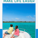 Children looking out over the water while seated on a boat, supported by smart boat day essentials.