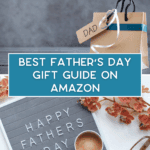 A gift bag labeled "Dad," a letter board reading "Happy Father's Day," a cup of coffee, and orange flowers surround a sign that says "Best Father's Day Gift Guide on Amazon.