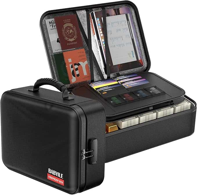 A black, hard-shell, fireproof document organizer box is open, displaying neatly arranged passports, folders, envelopes, cards, and files inside multiple compartments. The box has a handle and lock with "BABYILE FIREPROOF BOX" on the front—perfect for Tuesday Deals.