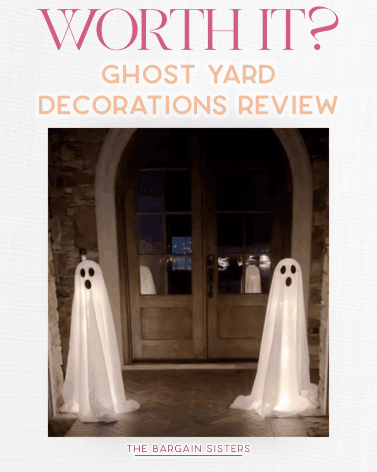 Two ghost yard decorations made of white sheets with black eye holes stand in front of double wooden doors at night. Text above reads, "Worth it? Ghost Yard Decorations Review." Discover if these spooky ghost yard decorations are worth adding to your Halloween setup!.