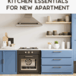 Modern kitchen with blue cabinets, wooden countertop, open shelves holding dishes and jars, wall-mounted range hood, and text that reads "Must-Haves Kitchen Essentials for New Apartment.