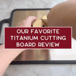 A person slices a potato on a titanium cutting board, with the text "Our Favorite Titanium Cutting Board Review" overlaid on the image. A web address, thebargainsisters.com, appears at the bottom.