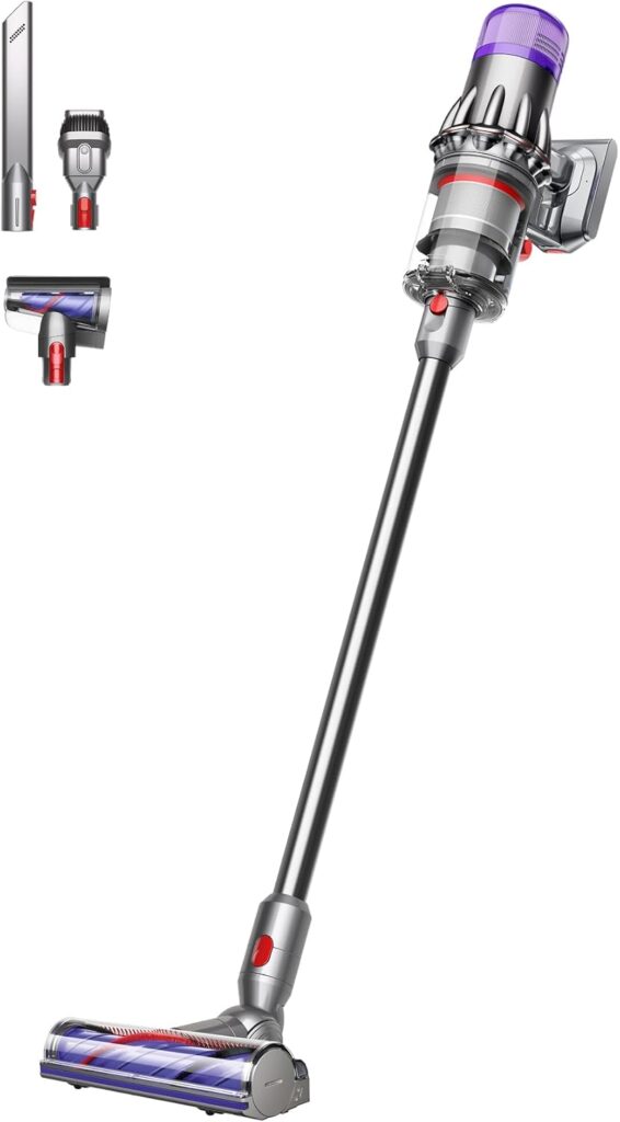 A cordless stick vacuum cleaner with a long handle and motorized floor head, shown with three interchangeable attachments. Its sleek silver, purple, and red design is perfect for Thursday Deals shoppers seeking style and versatility.