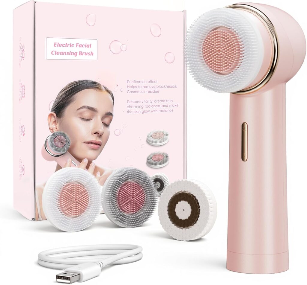 A pink electric facial cleansing brush with three interchangeable brush heads, a USB charging cable, and its packaging featuring a woman's face and product information—perfect for your next Tuesday Deals find.