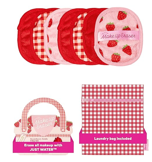 This Premium Beauty 7-Day Set features four strawberry-themed Makeup Eraser pads with red and pink plaid designs, plus matching packaging and a red plaid laundry bag. Effortlessly erase makeup with just water.