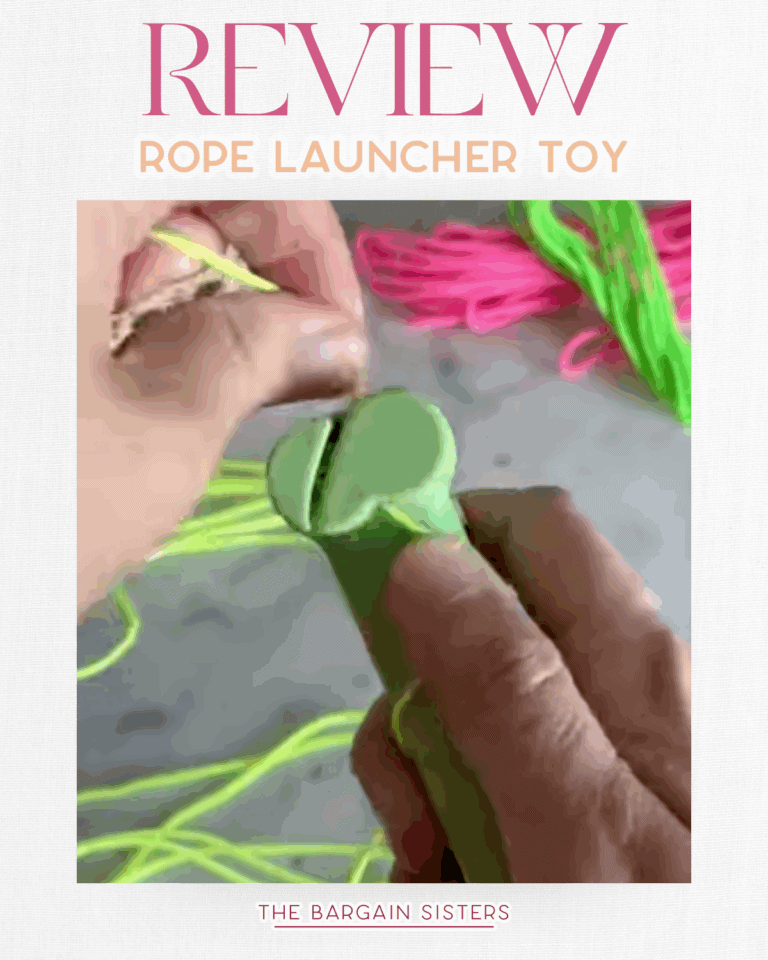 Close-up of hands loading a neon green rope into a rope launcher toy, with pink and green ropes in the background. Text above reads, “Review: Rope Launcher Toy,” and below, “The Bargain Sisters.”.