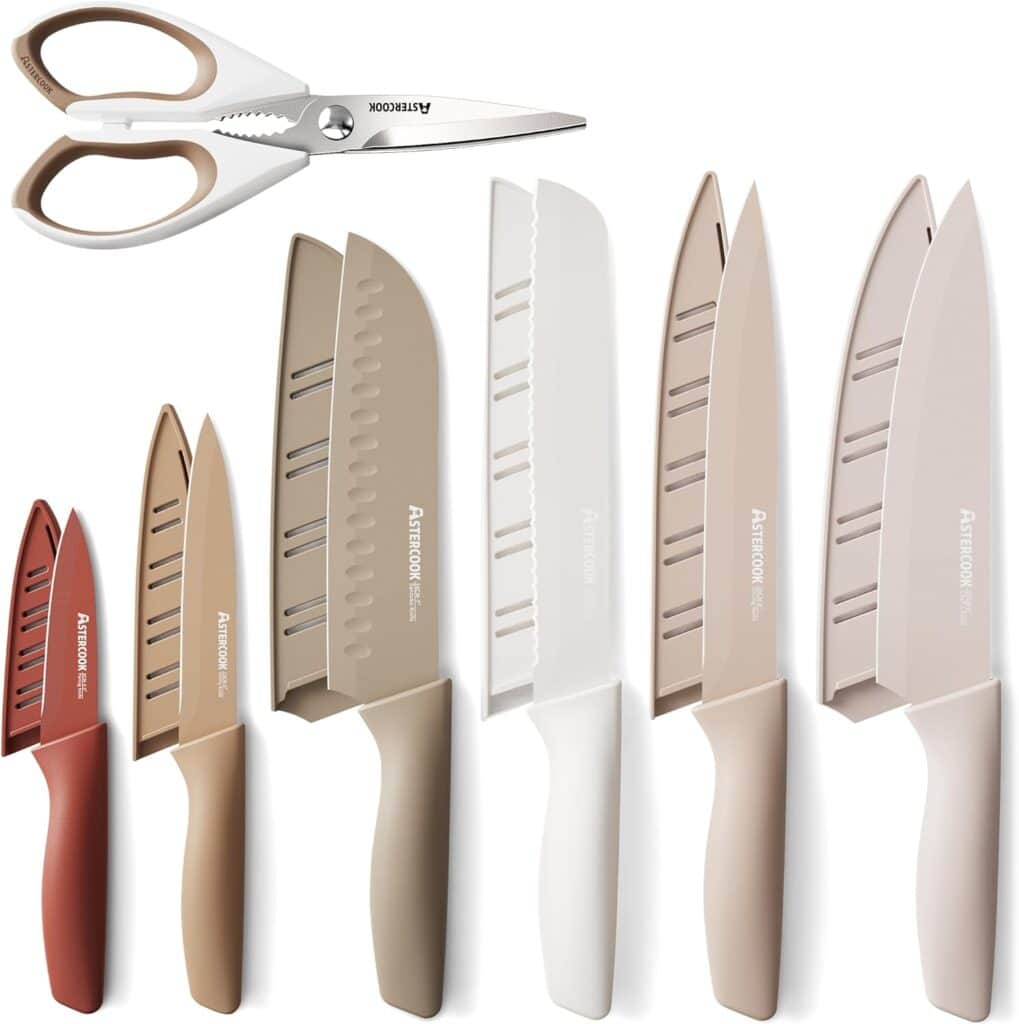 A set of six kitchen knives in various sizes and colors, each with matching blade covers, plus a pair of white and beige kitchen scissors at the top—perfect for your next Monday Deals find.