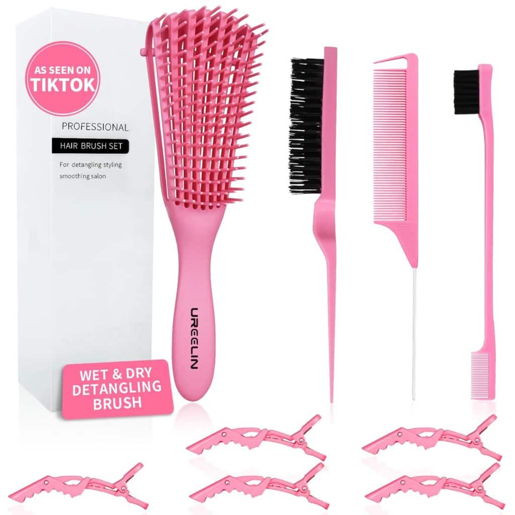 A pink hair brush set featuring a detangling brush, two combs, sectioning clips, and a brush cleaner. Displayed in front of “AS SEEN ON TIKTOK” packaging—perfect for Wet & Dry use and ideal for grabbing during Thursday Deals.