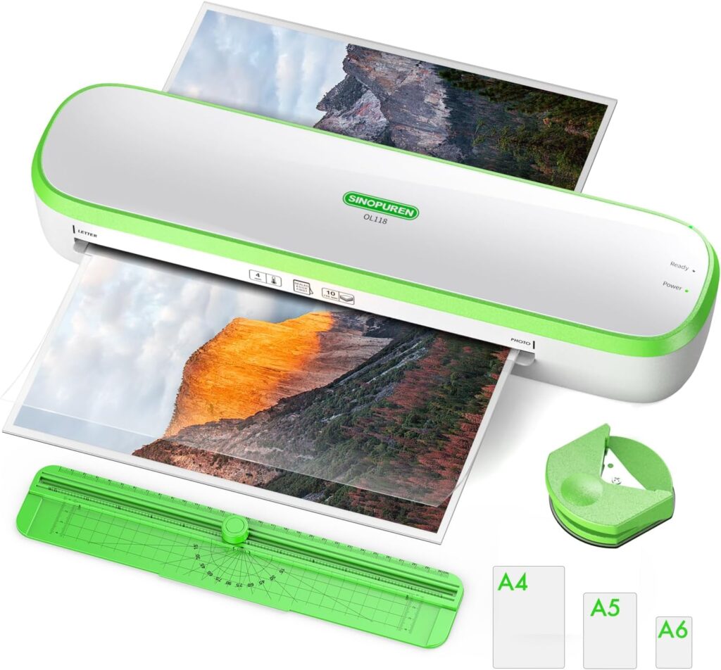 A green and white laminator is shown laminating a nature photo. Nearby are a green paper cutter, a corner rounder, and three paper size cards labeled A4, A5, and A6.