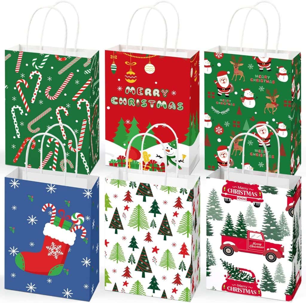 Six colorful Christmas gift bags with festive designs—candy canes, Christmas trees, Santa Claus, stockings, and a red truck—all featuring holiday patterns and white handles. Perfect for gifting during Thursday Deals!.