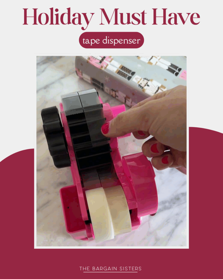 A hand with red nail polish uses a pink tape dispenser holding three rolls of tape, with a wrapped gift box in the background. Text above reads "Holiday Must Have: tape dispenser and Genius Battery Adapter for easy gifting at Home.