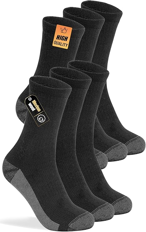 Five pairs of black crew socks with gray heels and toes are displayed standing upright. Two socks have labels that read "High Quality" and "Premium Quality.