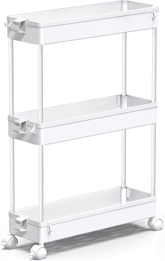 A white three-tier rolling storage cart with rectangular shelves and four wheels, designed for organizing items in small spaces such as kitchens, bathrooms, or offices.