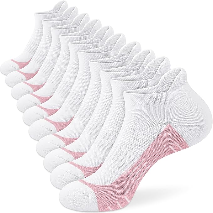 A row of nine white ankle socks with pink accents on the toes and heels, displayed in a staggered arrangement on a plain white background.