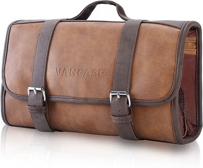 A brown leather Toiletry Bag for Men with a handle on top, two buckle straps on the front, and "WANCAVE" embossed in the center. The bag is neatly rolled and closed—get 50% off for a limited time!.