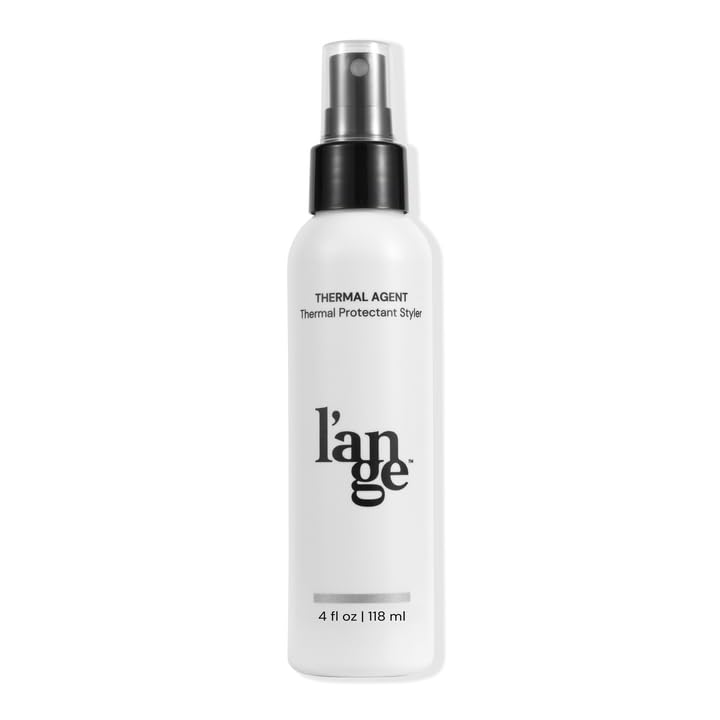 A white spray bottle labeled "l’ange Thermal Agent Thermal Protectant Styler," 4 fl oz (118 ml), with a black and silver spray nozzle.