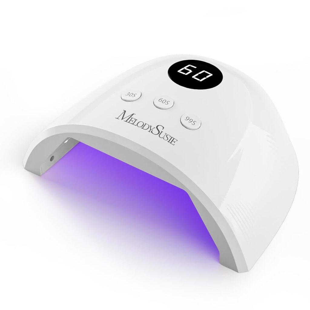 A white MelodySusie nail lamp with a digital timer display, three buttons labeled 30S, 60S, and 99S, and a purple LED light glowing underneath.