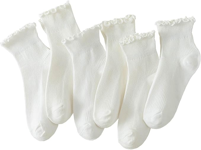 Six pairs of white ankle socks with a ruffled, scalloped trim are arranged side by side on a plain background.