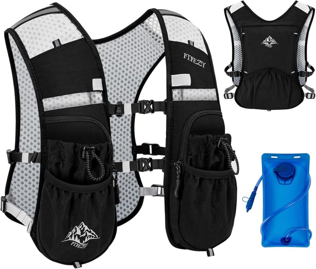 Black and gray running hydration vest with multiple pockets, adjustable straps, mesh back, and included blue water bladder with drinking tube shown separately.
