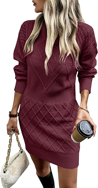 A woman wearing a textured, long-sleeve, maroon sweater dress holds a coffee cup in one hand and a beige handbag with a gold chain in the other. She has long, wavy blonde hair and is dressed stylishly.