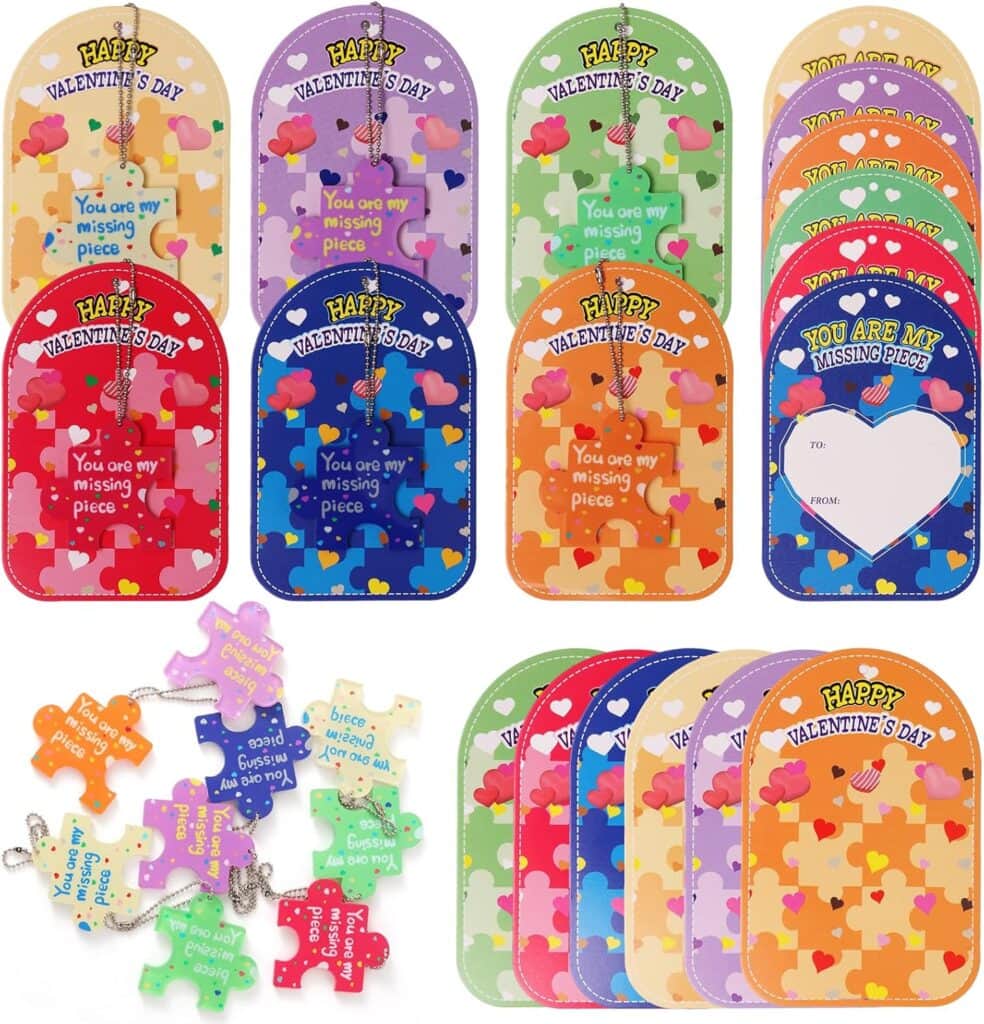 Colorful Valentine’s Day cards with puzzle piece designs and messages like “You are my missing piece.” Includes separate puzzle piece keychains and cards in red, purple, green, orange, and blue.