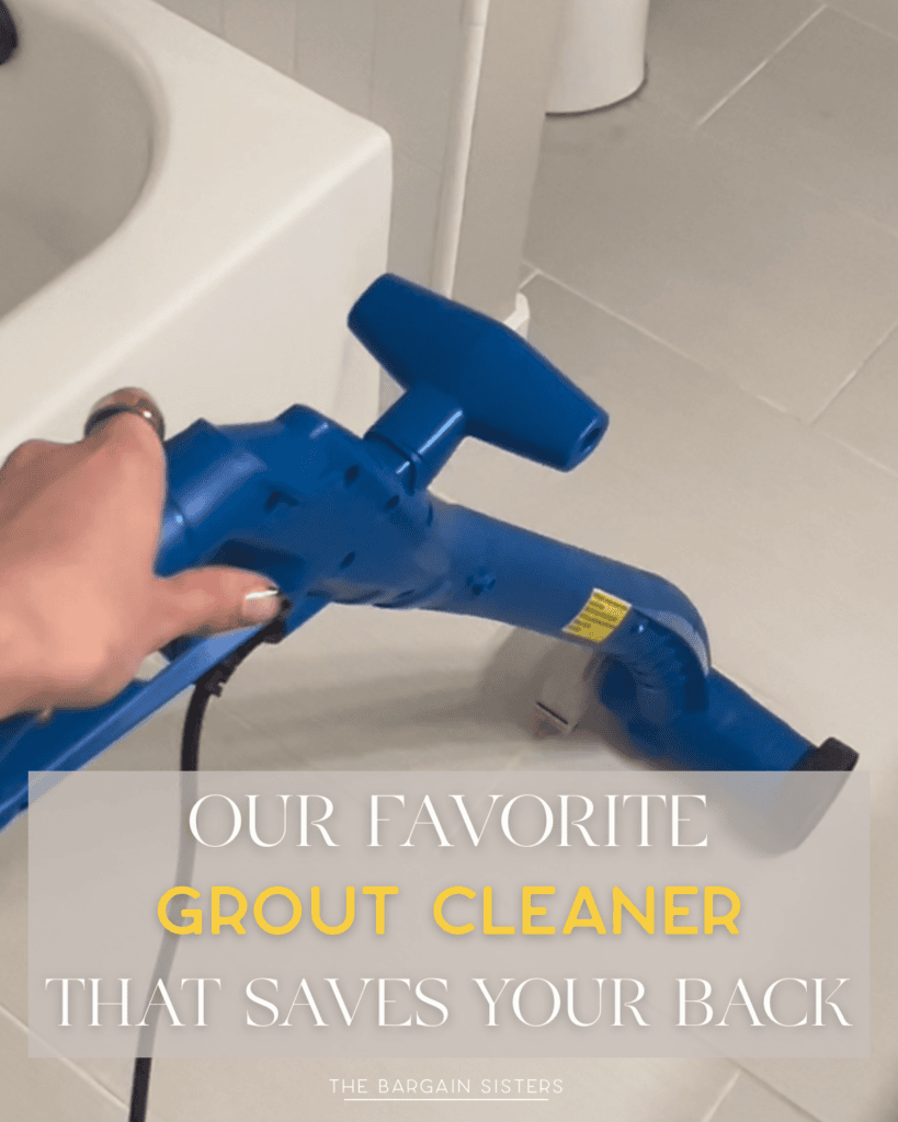A hand holds a blue grout cleaner on a bathroom tile floor next to a bathtub. Text on the image reads, "Our favorite grout cleaner that saves your back. The Bargain Sisters.