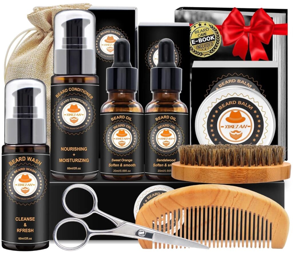 A beard grooming kit includes beard oil bottles, conditioner, balm, wash, a comb, scissors, a brush, a drawstring pouch, and a guidebook, all arranged neatly with black and orange packaging.