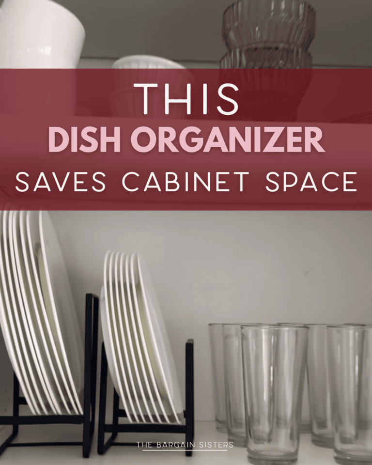 Plates are stored vertically in a black dish organizer on a white kitchen shelf, with glasses and bowls nearby. A reusable cake candle holder sits beside them. Text overlay reads: "This dish organizer saves cabinet space.