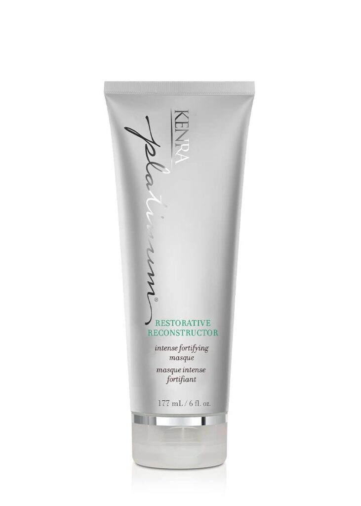 A silver tube of Kenra Platinum Restorative Reconstructor, an intense fortifying hair masque, 6 fl. oz. size, standing upright against a white background.