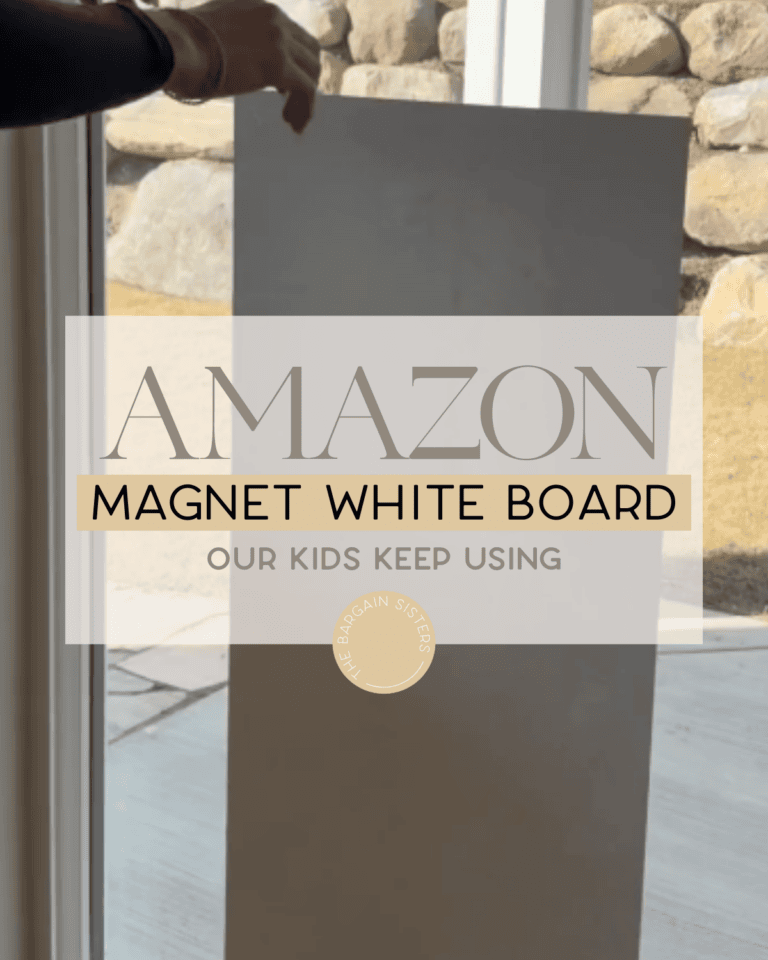A person holds up a large whiteboard in front of a window with rocks and grass outside. Overlay text reads: "Amazon Magnet White Board Our Kids Keep Using," with a circular logo at the bottom—perfect for organizing mini waffle maker breakfast ideas.