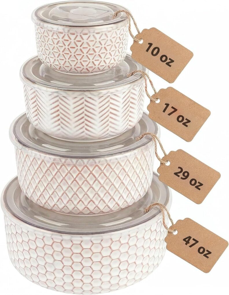 Four patterned ceramic bowls with clear lids are stacked in decreasing size. Each bowl has a brown tag indicating its capacity: 47 oz, 29 oz, 17 oz, and 10 oz—perfect for Thursday Deals on stylish kitchen essentials.