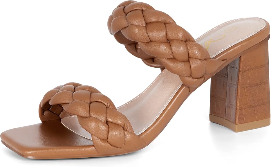 Step into Wednesday Deals with this tan heeled sandal, featuring two thick, braided leather straps and a square open toe. The chunky heel is textured with a chic crocodile pattern.