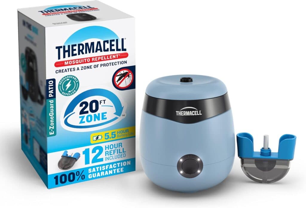 A Thermacell mosquito repellent device in blue sits next to its packaging box and a refill cartridge. The box highlights features like a 20 ft zone, 5.5-hour refills, and a 100% satisfaction guarantee.