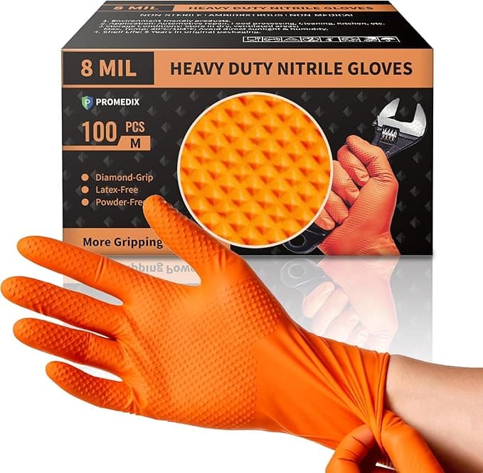 A hand wearing an orange, textured nitrile glove is shown in front of a box labeled "8 MIL Heavy Duty Nitrile Gloves, 100 pcs, Medium." These diamond-grip gloves are latex-free and powder-free—ideal for your Friday Deals!.