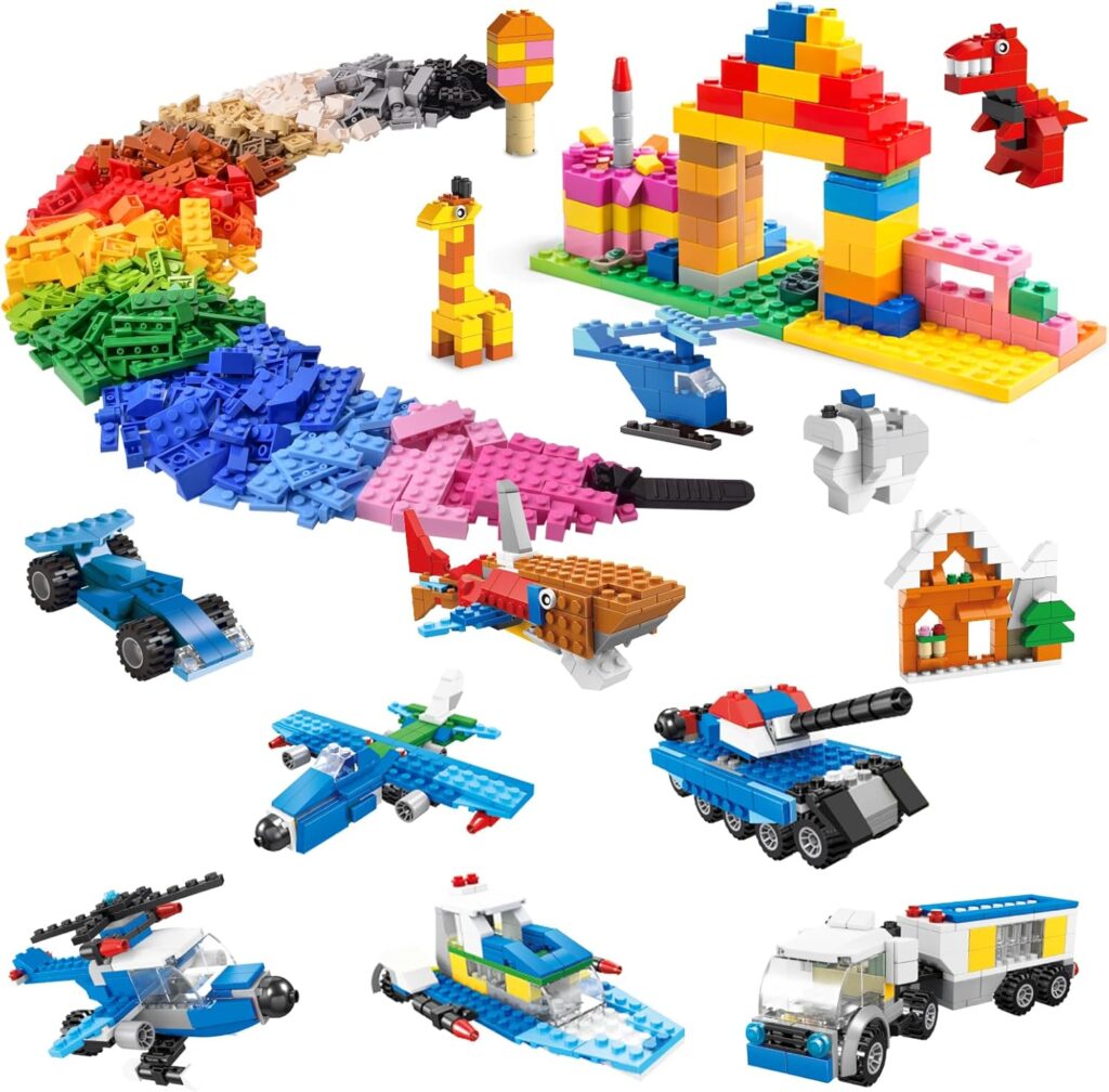 Colorful LEGO bricks arranged in a semi-circle with various small models built, including vehicles, animals, a house, dinosaur, helicopter, airplane, tank, giraffe, and a rainbow arch—perfect inspiration for your next Friday Deals find.