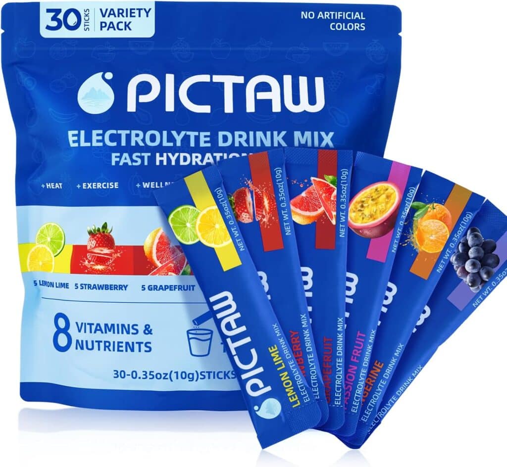 A blue bag of "PICTAW Electrolyte Drink Mix" with five stick packs in front, showing flavors like lemon lime, strawberry, grapefruit, tropical fruit, and blueberry. The bag advertises 30 sticks and 8 vitamins & nutrients.
