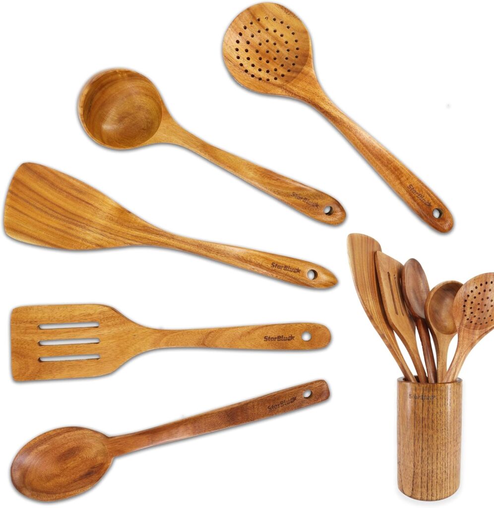 A set of wooden kitchen utensils, including a ladle, slotted spoon, spatula, and serving spoon, displayed both individually and together in a wooden holder. The utensils have a smooth, polished finish.
