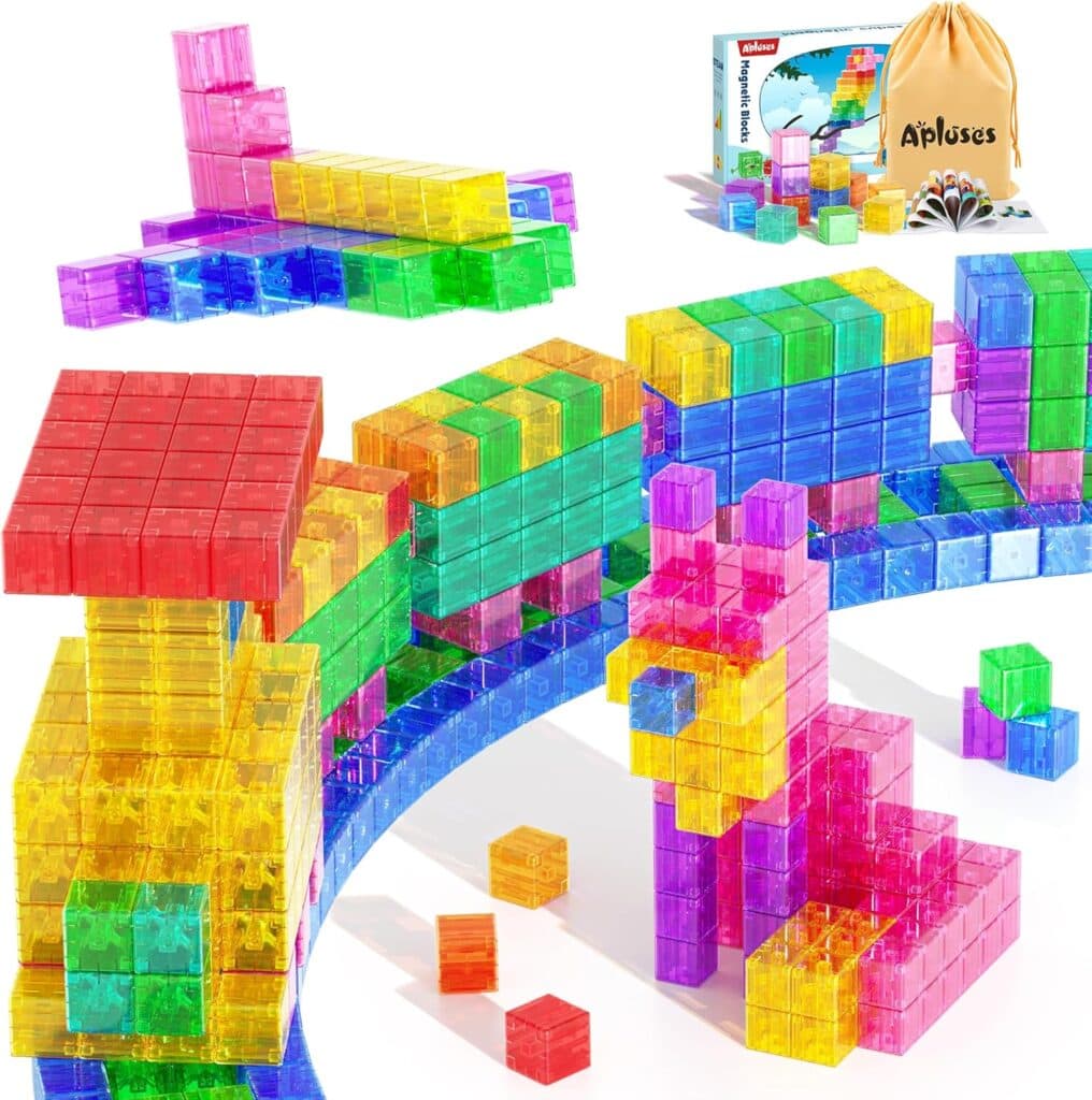 Colorful translucent plastic building blocks are stacked in playful shapes like arches and animal figures. In the background, a storage bag and "Appluses" product box appear—perfect for creative play and ideal for Friday Deals.