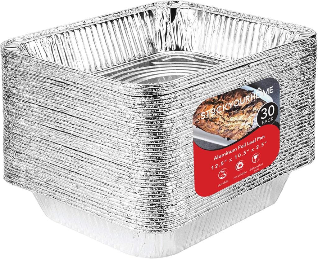 A stack of rectangular aluminum foil loaf pans with a red label indicating "30 pack" and the dimensions 12.5" x 10.5" x 2.5". The label features a baked dish and the brand name "Stock Your Home.