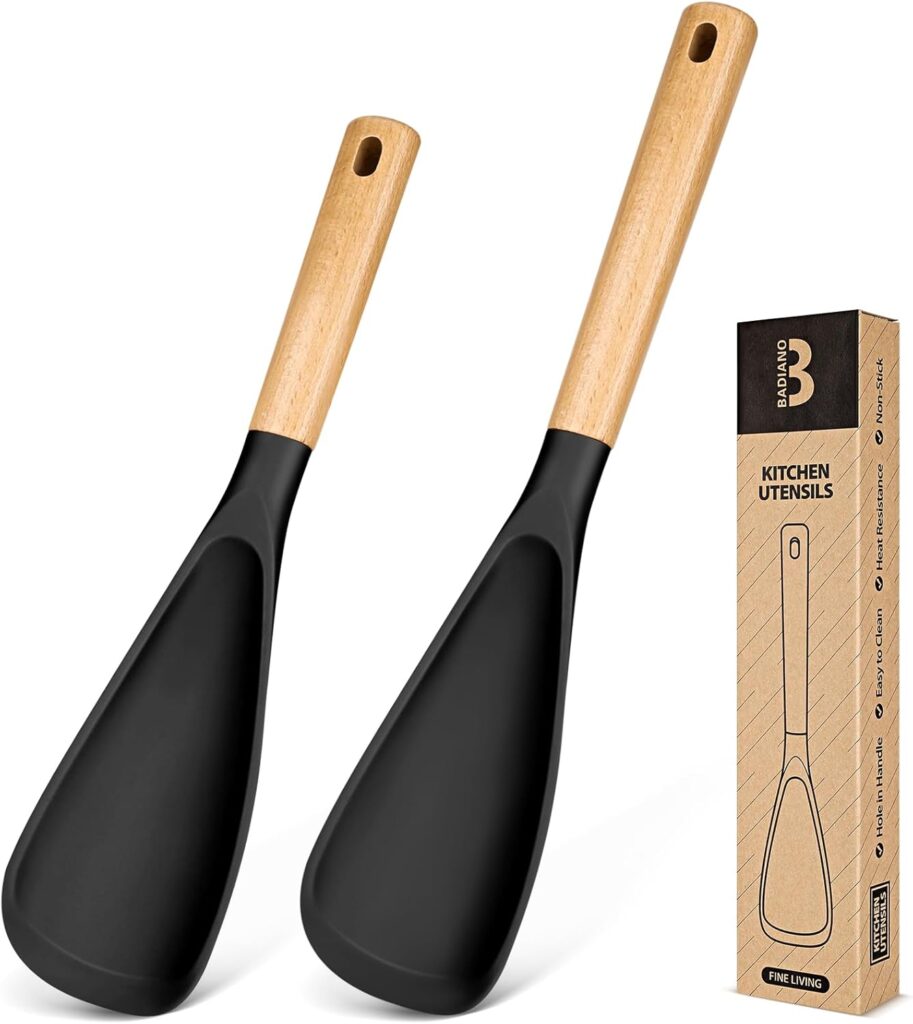 Two black kitchen spatulas with light wooden handles are displayed next to their cardboard packaging, featuring a line drawing of the utensil and "Kitchen Utensils" text—perfect for snagging during Tuesday Deals.